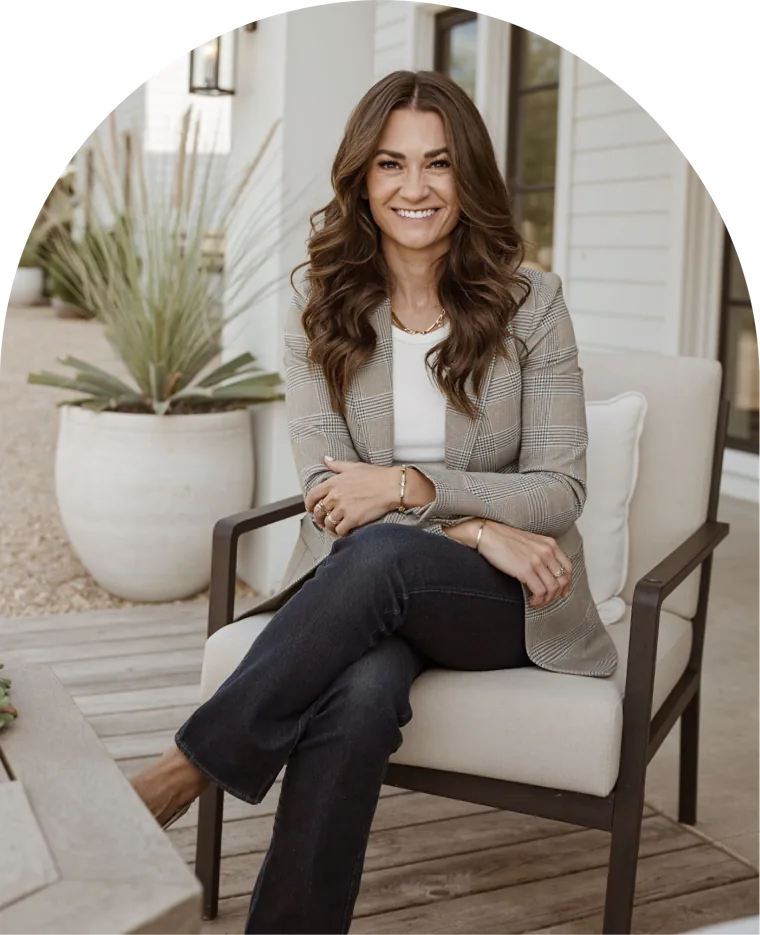 Kasey Ingram smiling on a patio